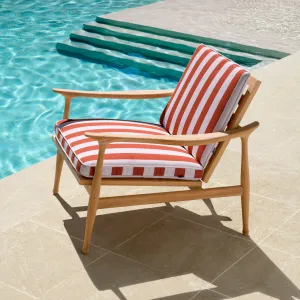 Luxury Outdoor Teak Wood Lounge Chair with Terracotta Orange and White Striped Cushions Lifestyle View by Luxury Group International