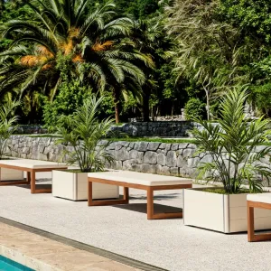 Luxury Outdoor Wooden Lounge Bench with Cushioned Seat Lifestyle View by Luxury Group International