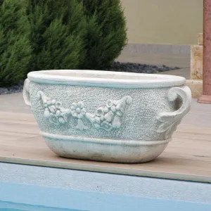 Jardinière ovale de luxe avec relief de guirlande florale et poignées en boucle - Jardinières de luxe Vue de face par Luxury Group International