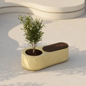 Luxury Pastel Yellow Oval Outdoor Planter with Integrated Dark Wooden Seating Front View by Luxury Group International