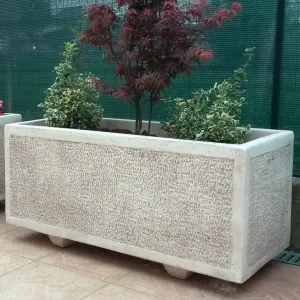 Luxury Rectangular Garden Planter with Framed Textured Panels - Luxury Planters Lifestyle View by Luxury Group International