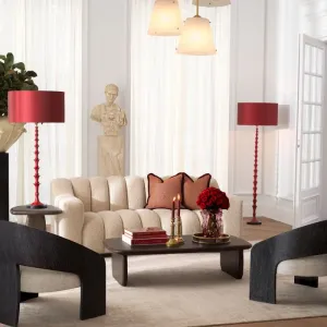 Luxury Red Sculptural Floor Lamp with Matching Drum Shade Lifestyle View by Luxury Group International