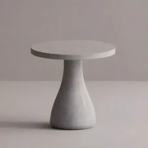 Table de luxe ronde en béton sur piédestal pour espaces intérieurs et extérieurs élégants par Luxury Group International