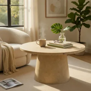 Luxury Round Pedestal Dining Table in Tan matte stone-look with speckled top Lifestyle View by Luxury Group International