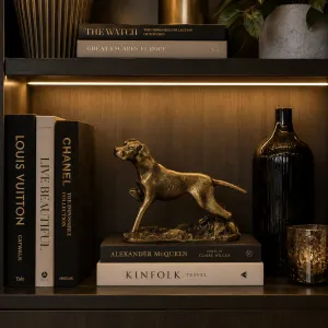 Luxury Running Dog Bronze Sculpture on Textured Base in Golden or Antique Bronze Finish Lifestyle View by Luxury Group International