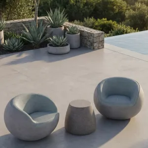 Luxury Sculptural Accent Chair in Light Gray Matte Concrete with Teal Blue Inner Cushion Front View by Luxury Group International