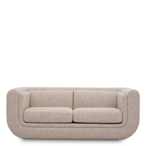 Luxus Skulpturales Beiges Sofa mit Geschwungener Form und Kokon-Silhouette Vorderansicht von Luxury Group International