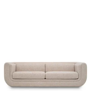 Luxus Skulpturales Beiges Sofa mit Geschwungener Form und Kokon-Silhouette Vorderansicht von Luxury Group International