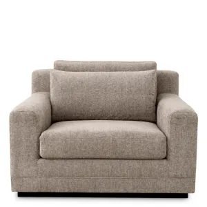 Fauteuil Lounge Luxueux Taupe Rembourré avec Base Noire - Mobilier de Luxe pour Hôtels Vue de face par Luxury Group International