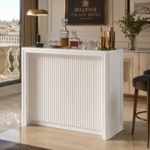 Luxury White Fluted Bar Table with Glass Top for Hotel Interiors Lifestyle View by Luxury Group International