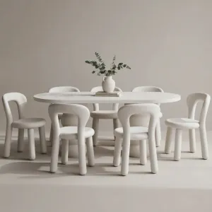 Luxury White Oval Concrete Dining Table with Sculptural Pedestal Base Lifestyle View by Luxury Group International