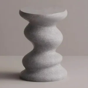 Luxury sculptural concrete side table with wavy scalloped design - Luxury hotel furniture by Luxury Group International