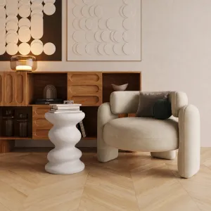 Luxury sculptural concrete side table with wavy scalloped design - Luxury hotel furniture Lifestyle View by Luxury Group International