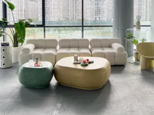 Modern Stone Coffee Table with Rounded Organic Design -Luxury Coffee Table Lifestyle View by Luxury Group International