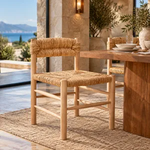 Natural Rattan Dining Chair with Handwoven Seat and Wooden Frame -Luxury Hotel Furniture Lifestyle View by Luxury Group International