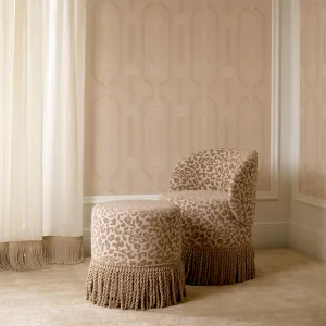 Round Beige Upholstered Stool with Patterned Fabric and Decorative Fringe - Luxury Hotel Furniture Lifestyle View by Luxury Group International