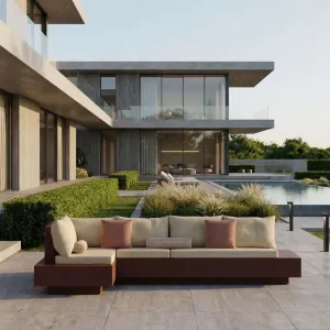 Ruby Red Luxus L-förmiges Betonsofa mit cremefarbenen Kissen – Gartenmöbel Lifestyle-Ansicht von Luxury Group International
