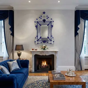 Venetian Style Luxury Glass Wall Mirror with Royal Blue Floral Accents & Ornate Crown Crest Lifestyle View by Luxury Group International