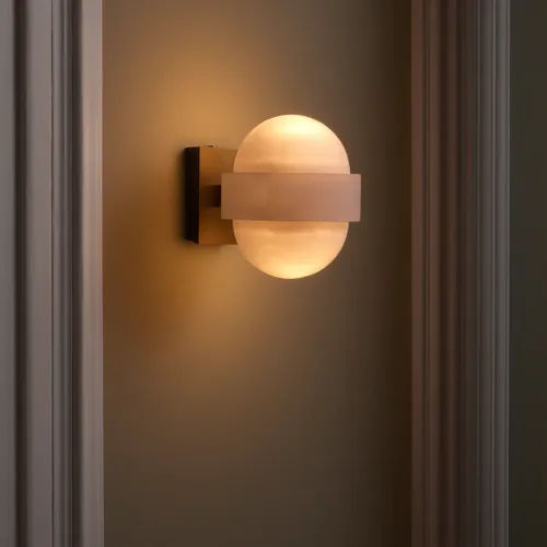 Antique brass finish luxury alabaster single white globe golden frame wall lamp by Luxury Group International