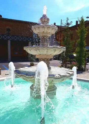 Baroque Luxury Multi-Tiered Water Fountain with Sculpted Bowls in Octagonal Basin - Baroque Fountain Detail View by Luxury Group International