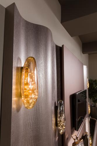 Beige Brown wavy panel Luxury TV unit with integrated amber lighting by Luxury Group International