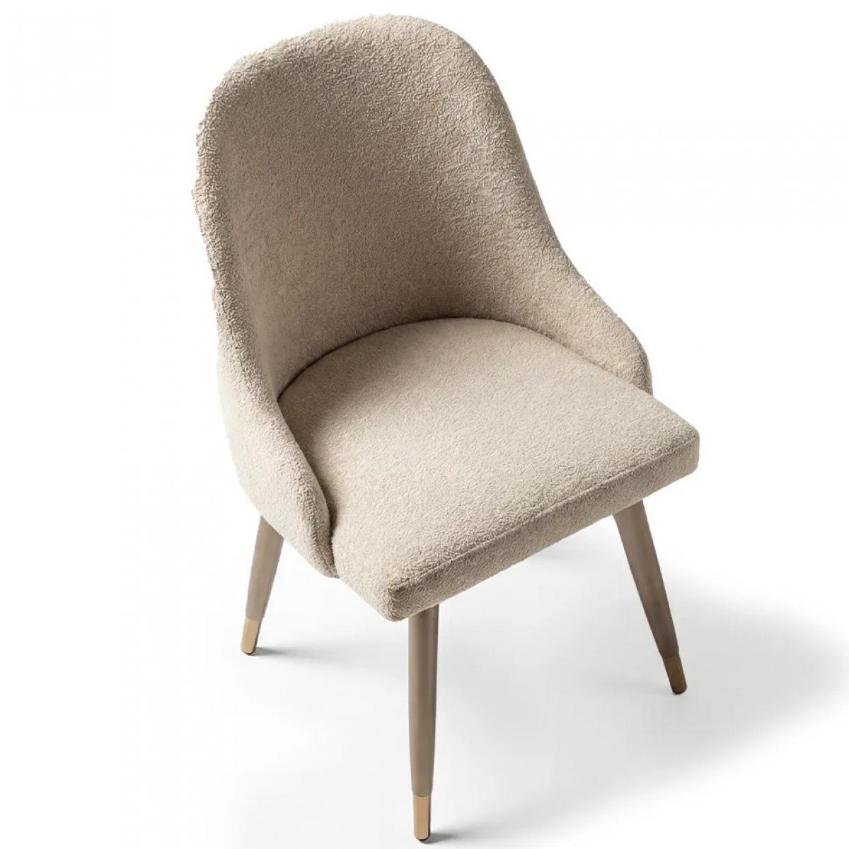 Light beige boucle upholstered luxury modern dining chair with rounded backrest by Luxury Group International