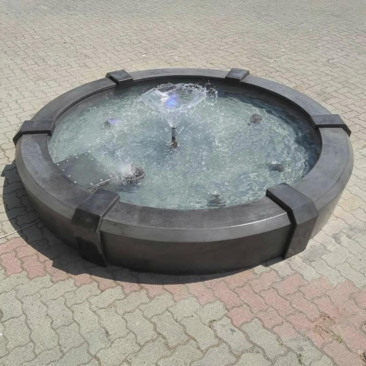 Luxury Dark Stone Circular Baroque Fountain with Vortex Water Feature - Baroque Fountain Front View by Luxury Group International