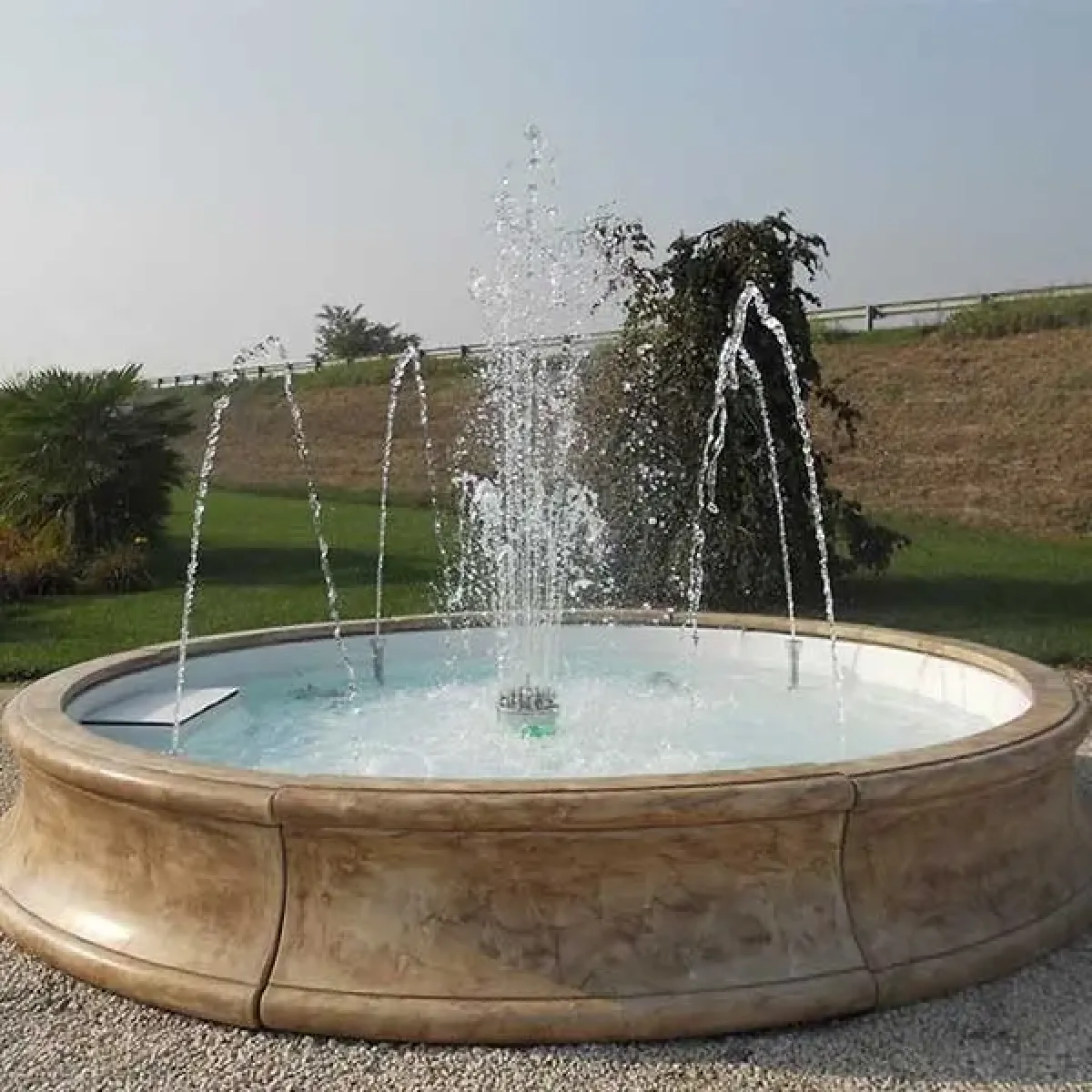 Luxury Stone-Finish Baroque Fountain with Illuminated Central Jet & Radial Arc Spouts - Baroque Fountain Front View by Luxury Group International
