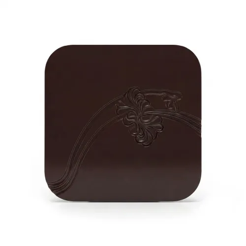 Dark brown rectangular wooden coffee table with floral design by Luxury Group International