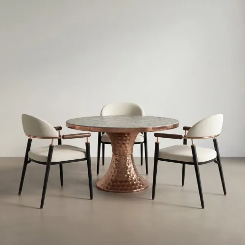 Dark gray marble round top luxury modern dining table with rose gold base by Luxury Group International