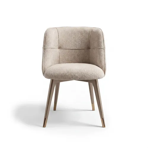 Light beige upholstered elegant modern luxury dining chair with paneled back by Luxury Group International