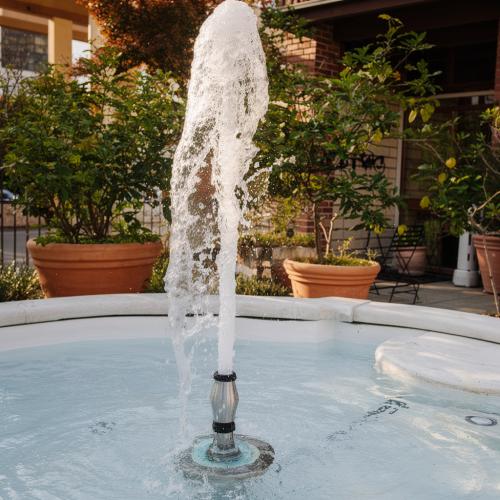 Luxury Baroque Central Jet Water Fountain with Sculpted Curved Basin - Baroque Fountain Detail View by Luxury Group International
