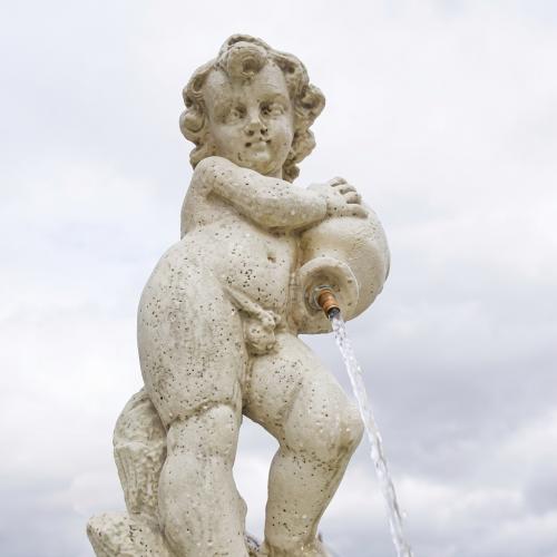 Luxury Baroque Cherub Water Fountain with Sculpted Basin & Fluted Pedestal - Baroque Fountain Detail View by Luxury Group International