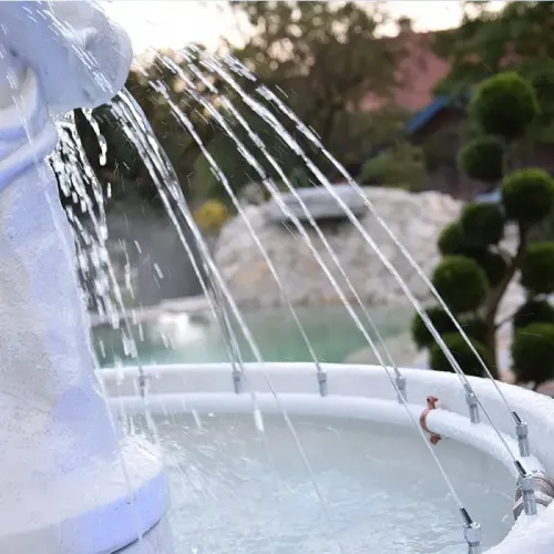 Luxury Baroque Female Sculpture Water Fountain with Radiating Jet System in Circular Basin - Baroque Fountain Detail View by Luxury Group International