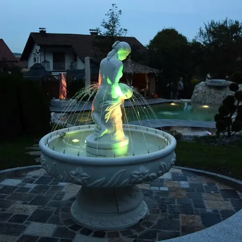 Luxury Baroque Female Sculpture Water Fountain with Radiating Jet System in Circular Basin - Baroque Fountain Side View by Luxury Group International