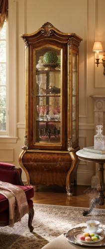 Luxury Baroque Wooden Glass Display Cabinet in Gold Accent with Ornate Crown Crest & Curved Storage Base Lifestyle View by Luxury Group International