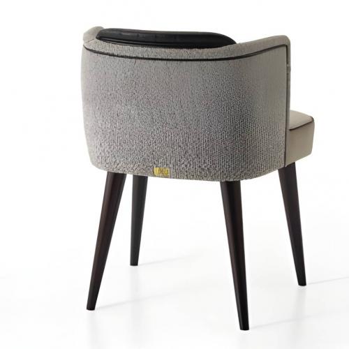 Luxury Beige Upholstered Dining Armchair with Fluted Leather Wrap Back and Tapered Dark Wood Legs by Luxury Group International