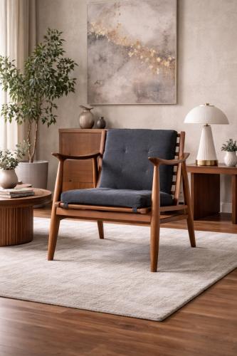Luxury Black Upholstered Wooden Lounge Armchair with Solid Wood Frame-Living room Armchair Lifestyle View by Luxury Group International