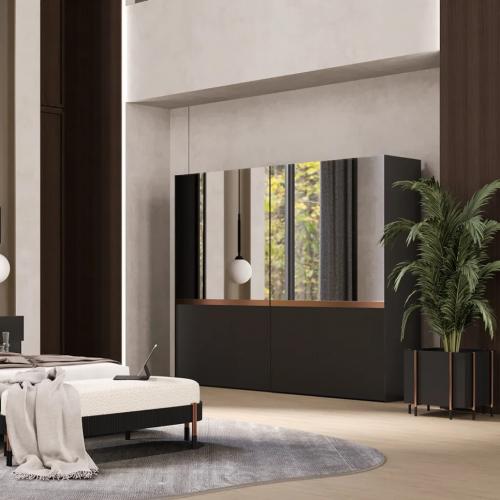 Armario de Dormitorio Negro de Lujo con Acabado Negro Mate, Espejo y Elegantes Detalles en Cobre Vista lifestyle por Luxury Group International