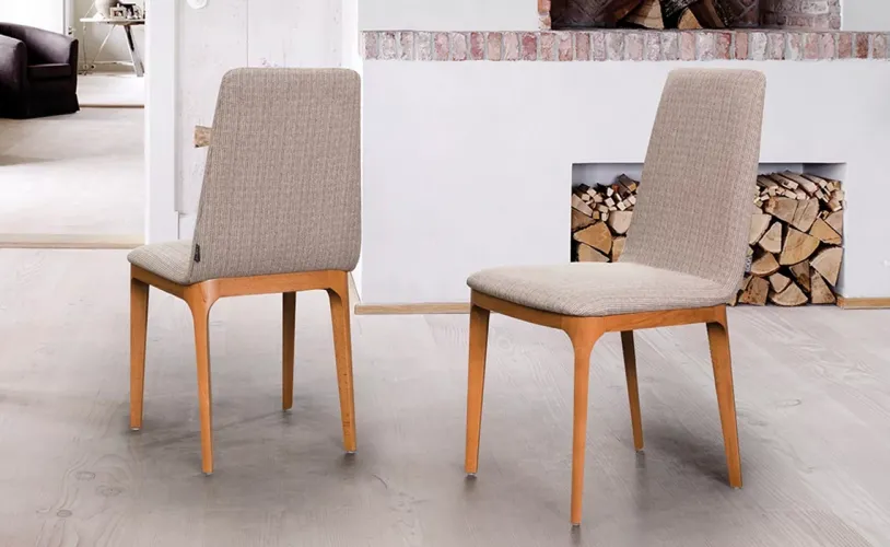 Luxury Cream Fabric Upholstered Armless Wooden Dining Chair Lifestyle View by Luxury Group International