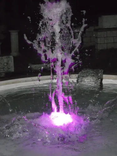 Luxury Illuminated Circular Baroque Water Fountain with Central Jet and Arc Spouts - Baroque Fountain Detail View by Luxury Group International