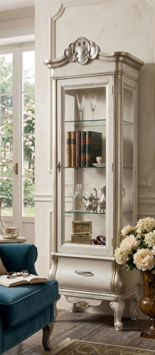 Luxury Ivory Baroque Glass Display Cabinet in Silver Accent with Sculpted Crest & Curved Storage Base Lifestyle View by Luxury Group International