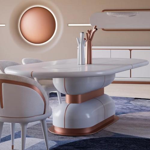 White Marble Oval Top Luxury Dining Table with Copper Accents Lifestyle View by Luxury Group International